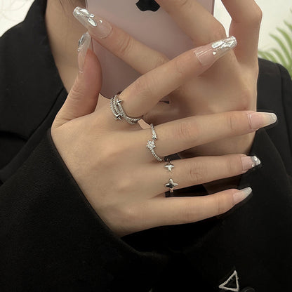 Zircon Cross Asterism Rings